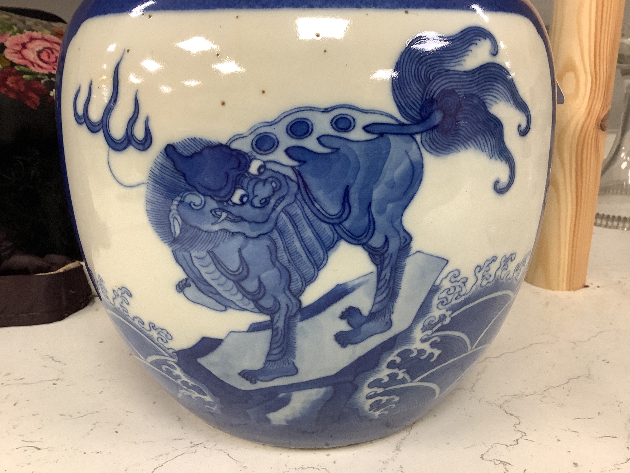 A pair of 19th century Chinese blue and white 'mythical beast' jars